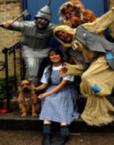 Taking a break from rehearsals in St Pauls Church Hall in Oriental Road were main cast members  Casey Lim (Dorothy), Ben Woodward (Tinman), David Oliver (Lion), Richard Carey (Scarecrow) and Freddie the dog as Toto.